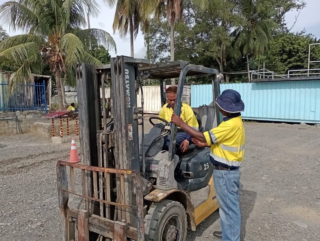Heavy Equipment Fitting students training on a forklift
