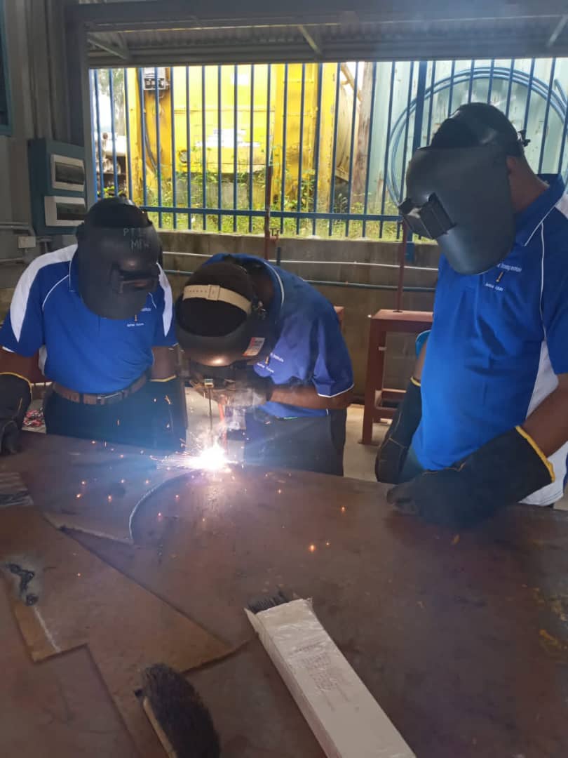 Metal Fabrication & Welding students welding a workpiece